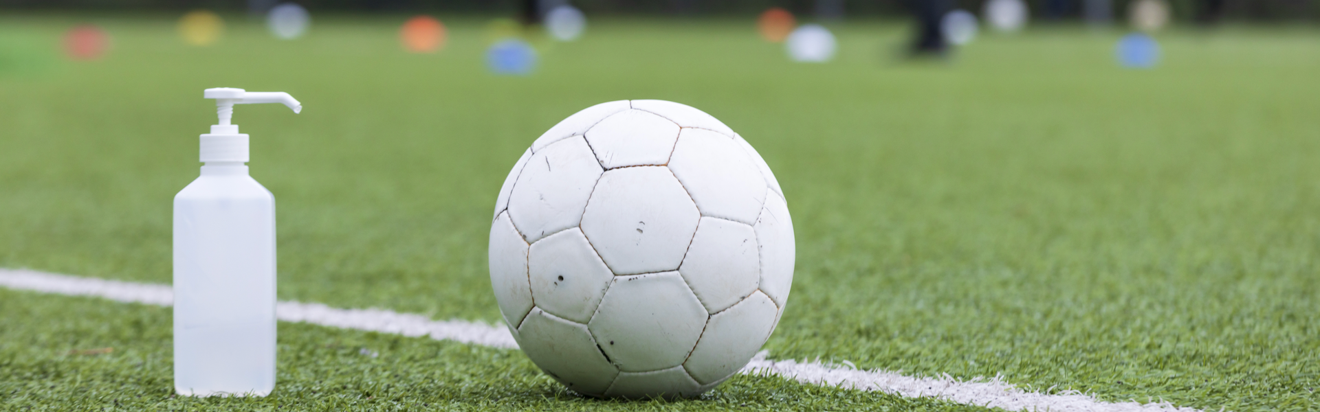 Football and sanitiser bottle