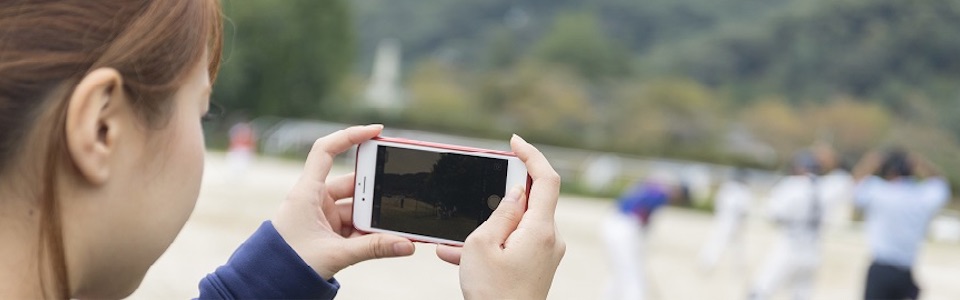 Girl looking at mobile phone