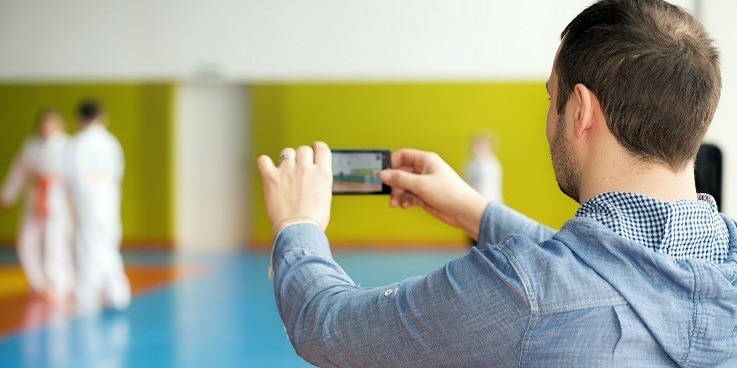 Man taking photos of children image