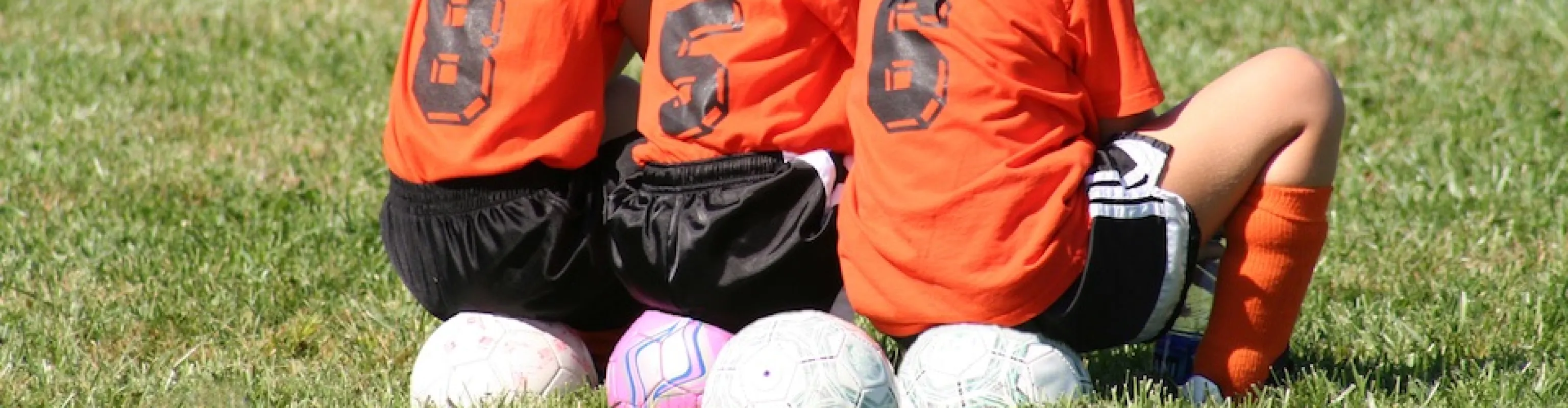 Kids watching football