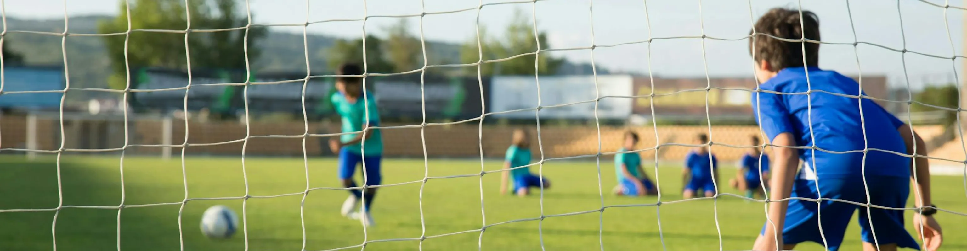Kids playing football