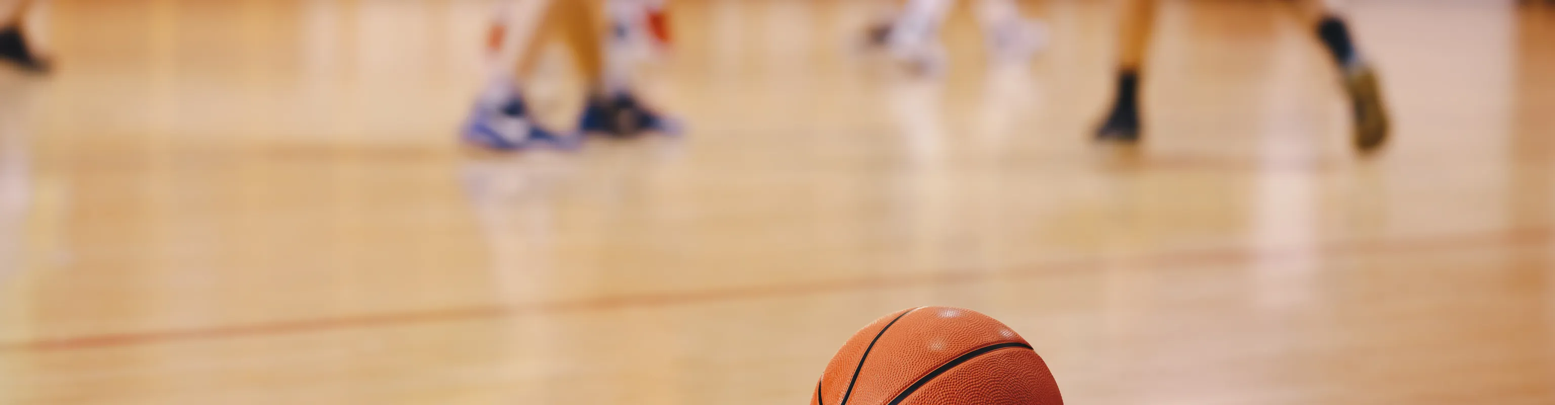 Basketball on a basketball court