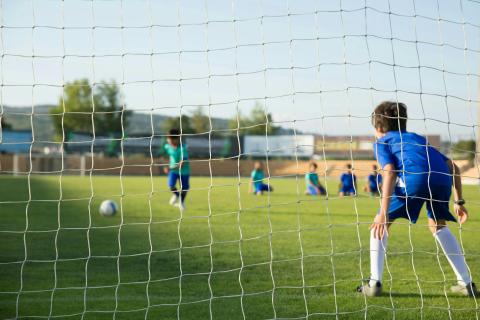 Kids playing football