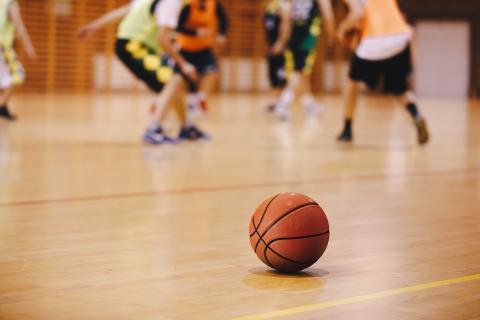 Basketball on a basketball court