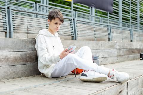 Young boy on a phone