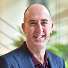 Photo of man smiling at camera