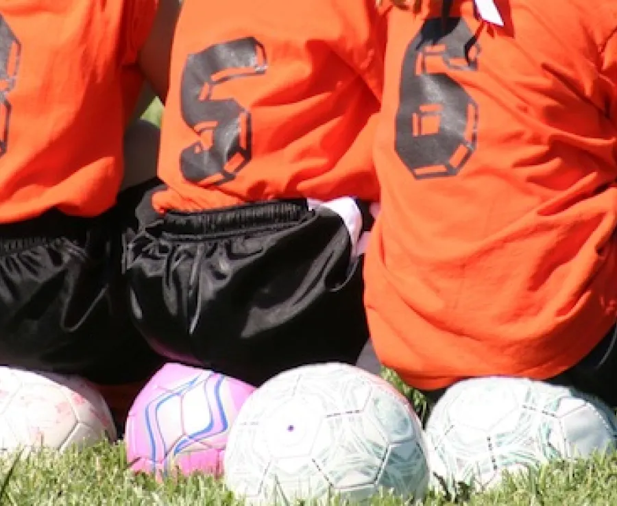 Kids watching football