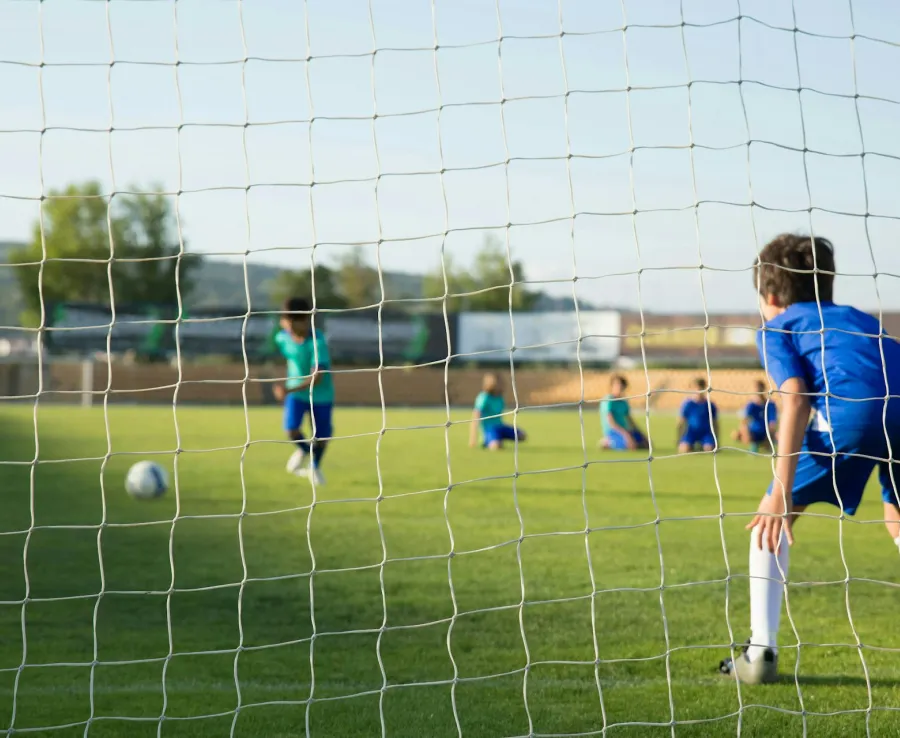 Kids playing football