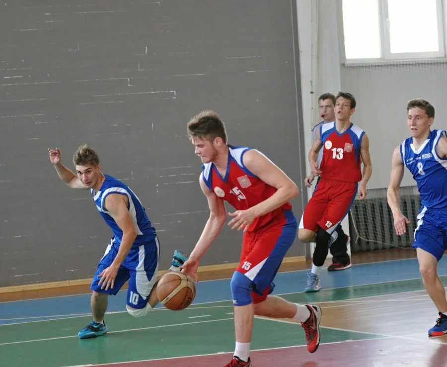 Boys playing basketball
