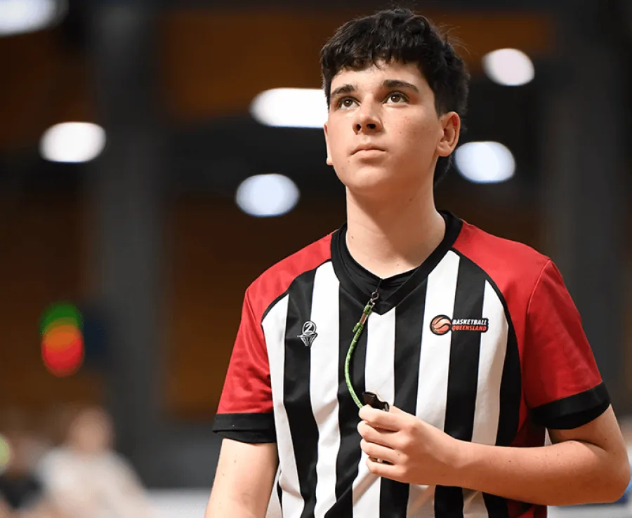 Referee in basketball court